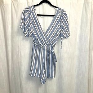 Striped white and baby blue romper, with wrap around belt and tie in the back